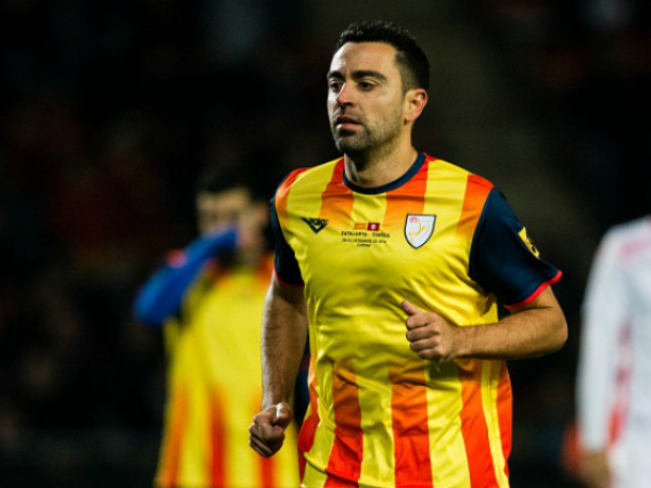 Xavi, Pique thi đấu cho tuyển Catalonia